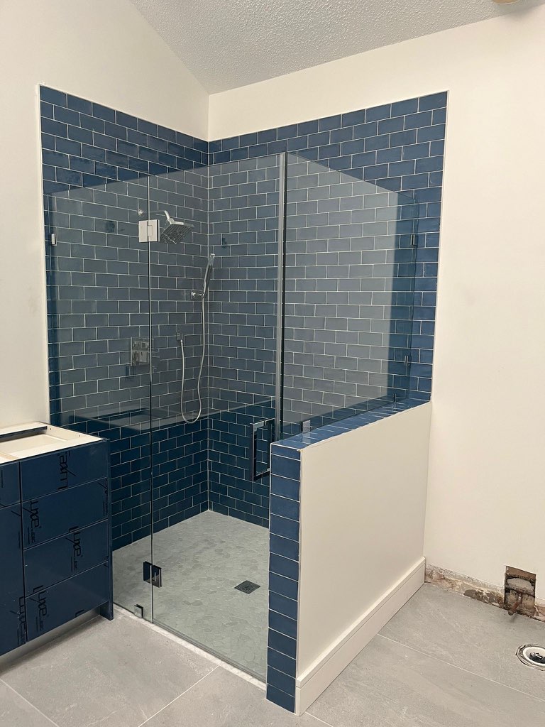 Frameless Shower · Blue Subway Tile — After